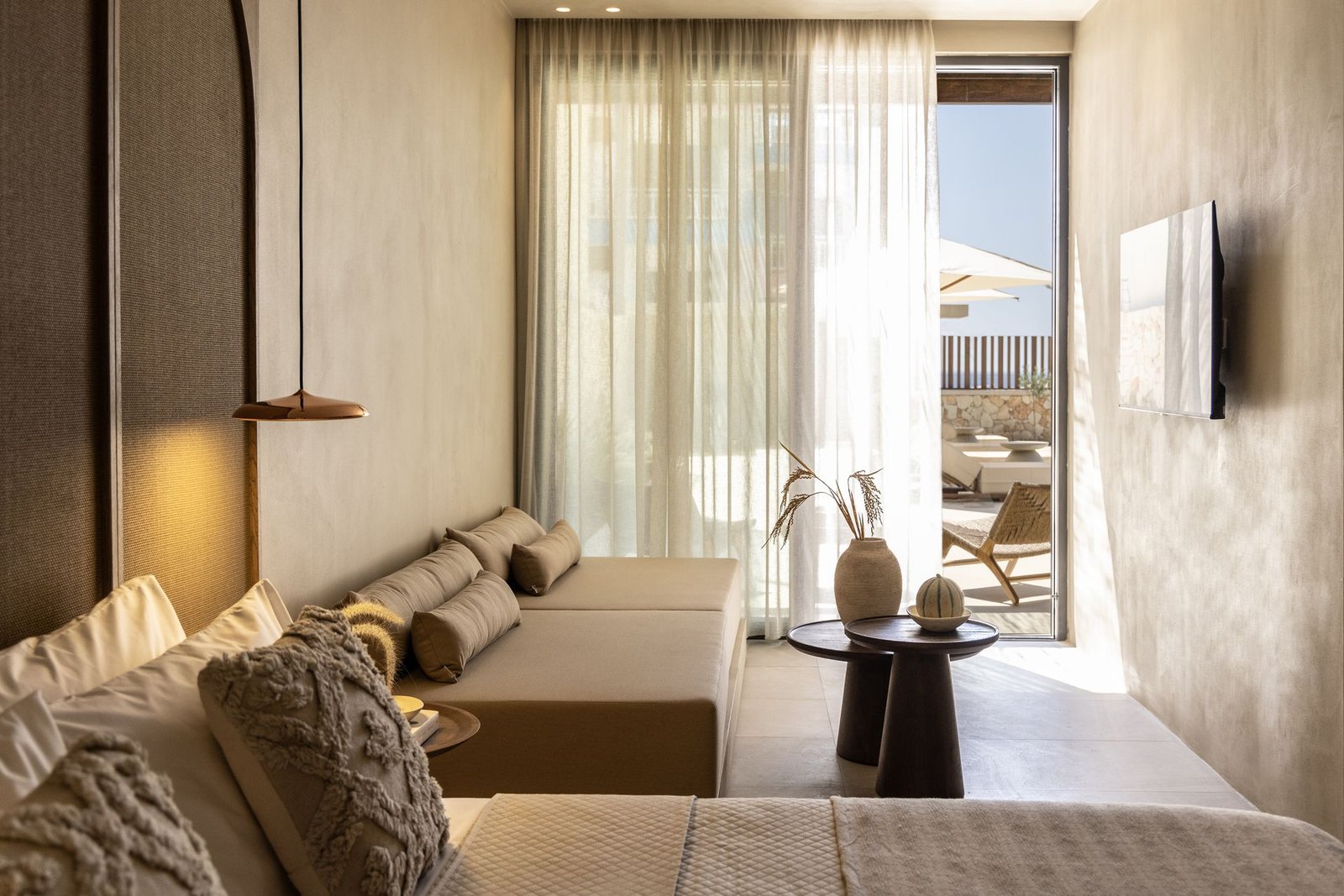 Elysia Suite bedroom opening to its terrace