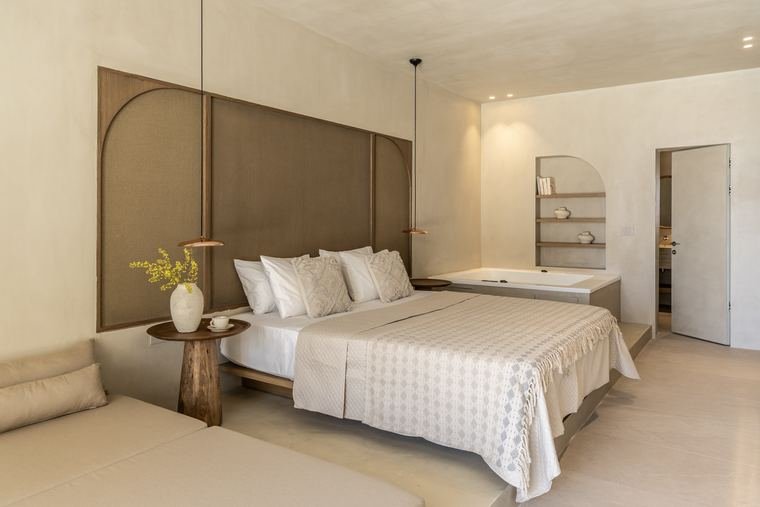 Althea bedroom beneath its arch