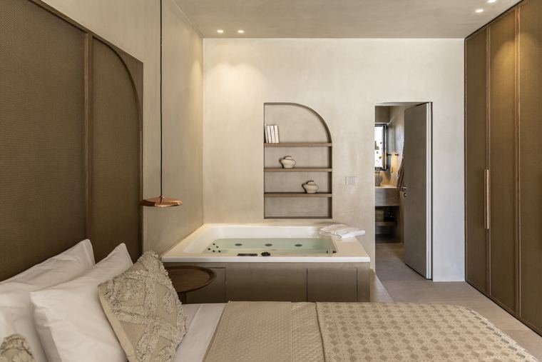 Althea Suite jacuzzi beside the bed