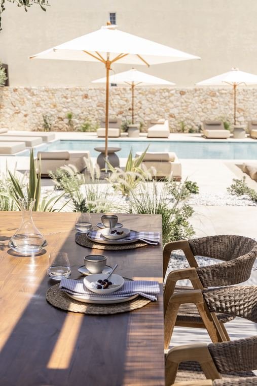 Outdoor dining with pool view