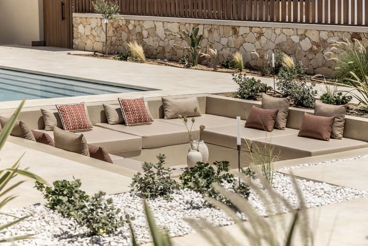 Sunken lounge against the stone wall