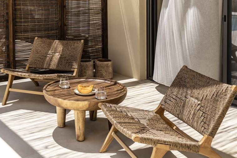 Hand-woven chairs on the terrace