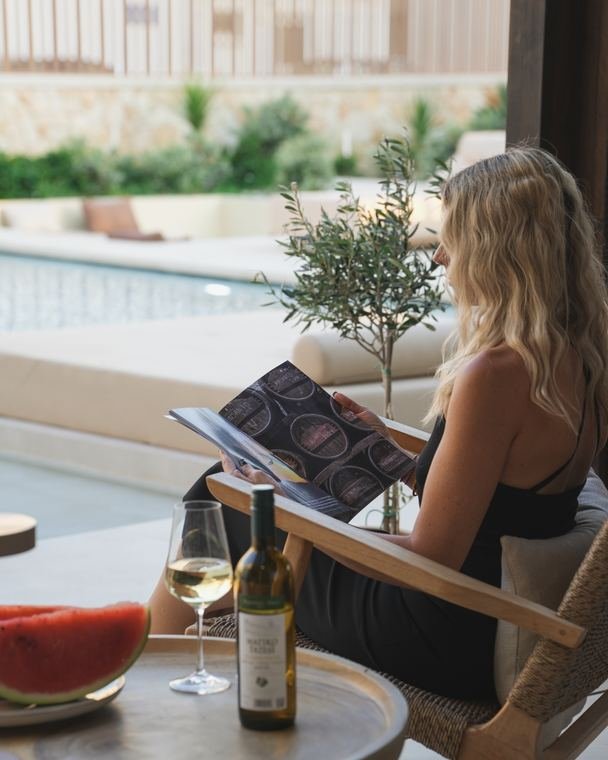 An unhurried read by the pool